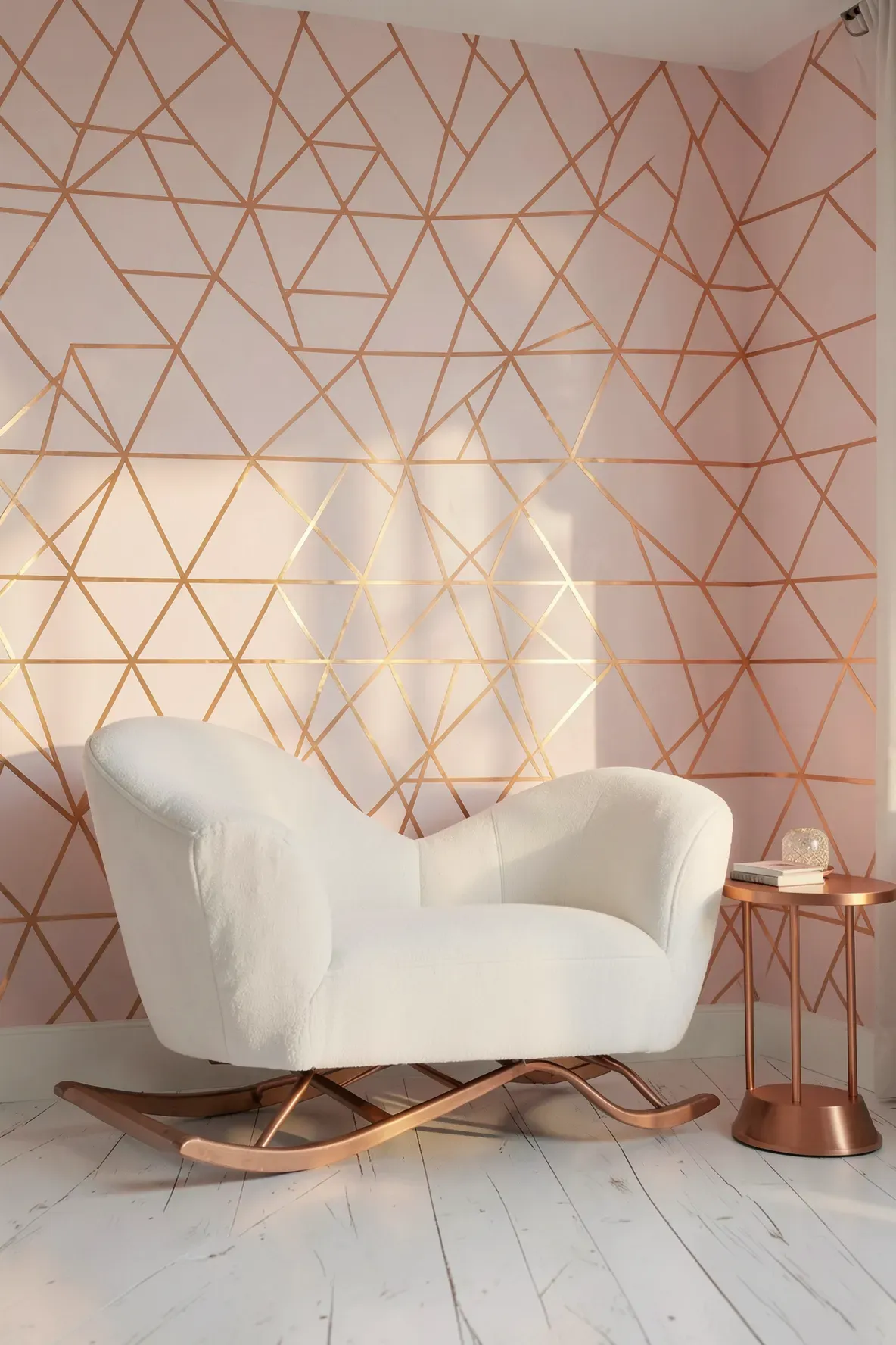 Pale pink geometric triangles with metallic copper outlines on a modern nursery accent wall.