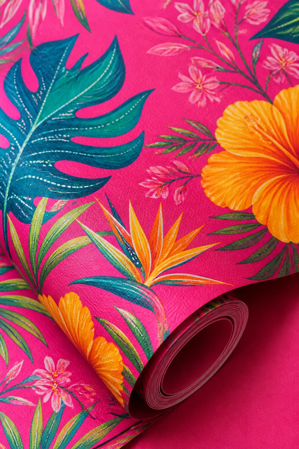 Macro view of hot pink tropical wallpaper with green palm leaves and yellow flowers.