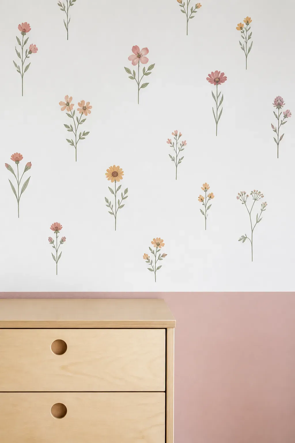 Assorted wildflowers arranged like a meadow on a wall