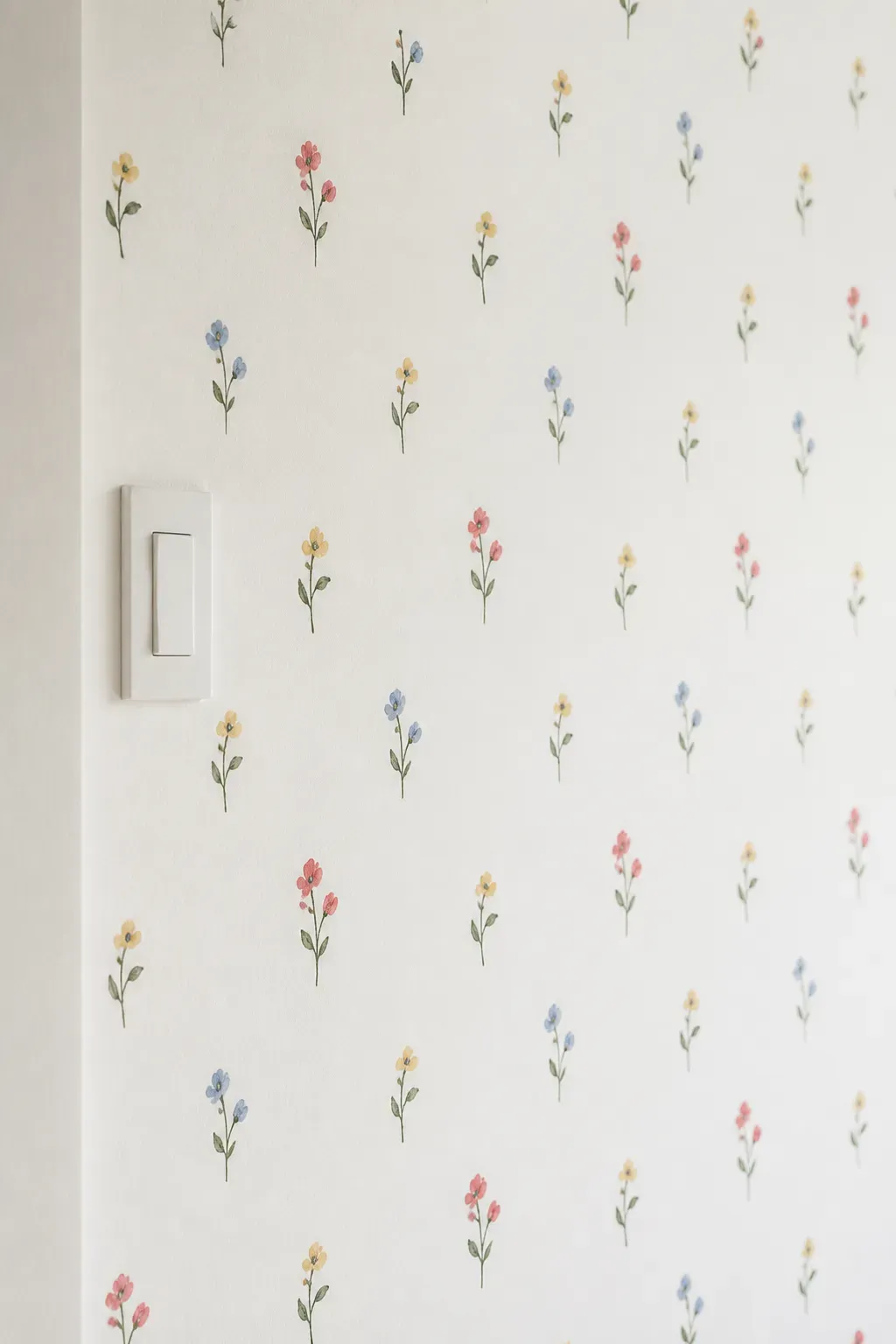 Repeating small floral pattern on wallpaper