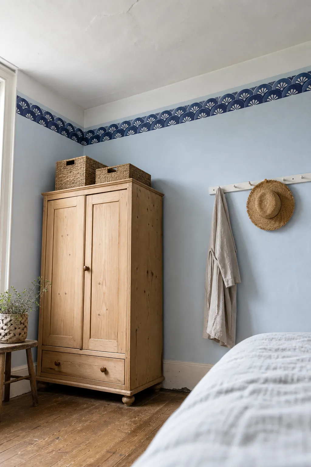 Graphic peel and stick border below the ceiling in a rental bedroom