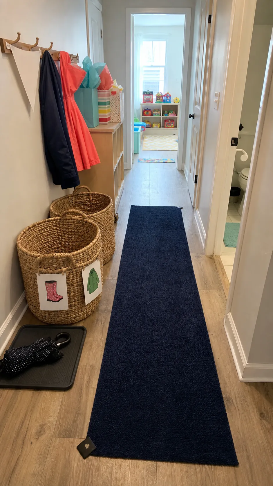 Playroom party welcome zone with shoe baskets and clear walkway