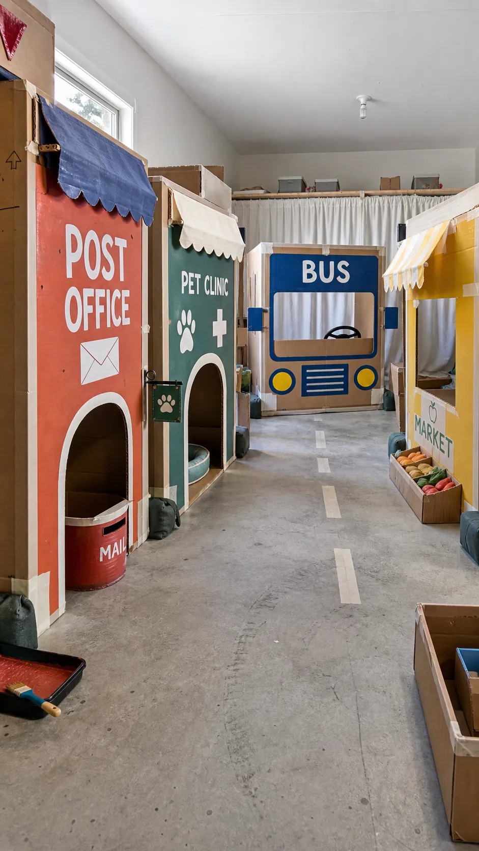Cardboard box town for playroom birthday activities