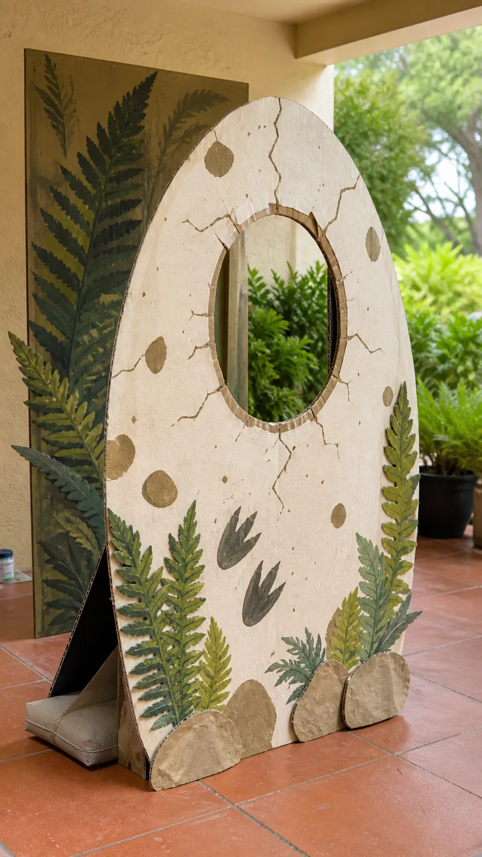 Cardboard dinosaur egg kids photo booth
