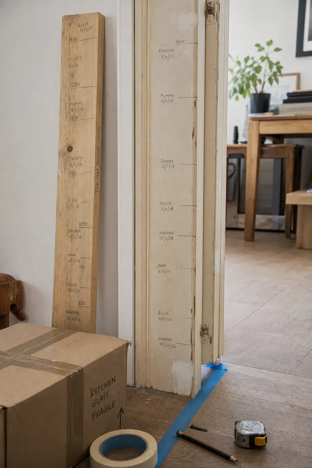 Portable wooden board preserving family doorframe height marks