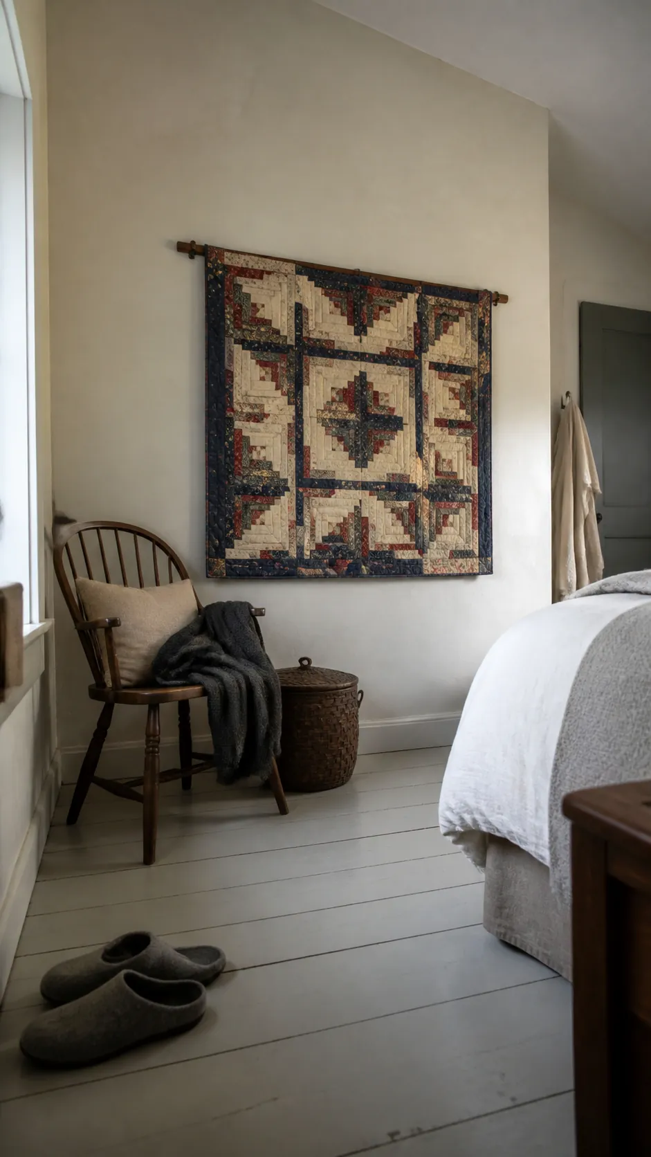 Handmade quilt displayed on a calm bedroom side wall