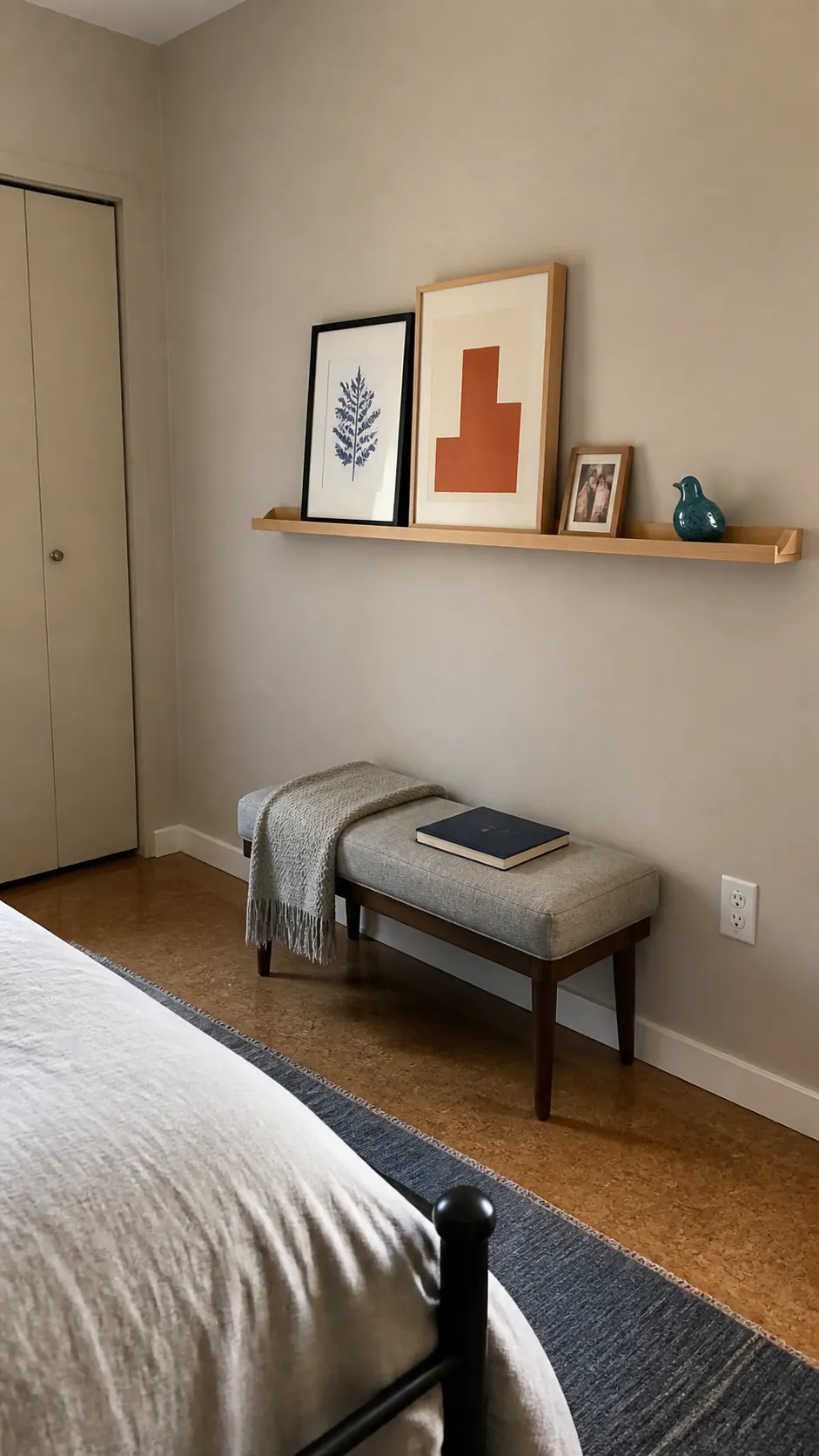 Changeable picture ledge on a cozy bedroom wall