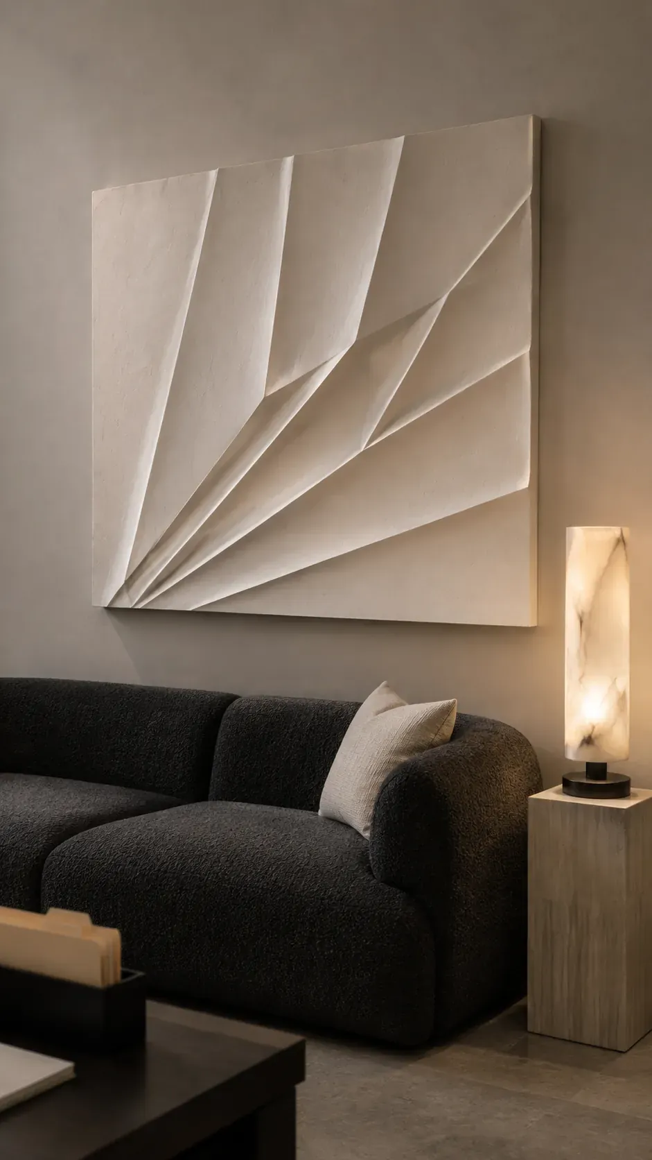 Textured plaster relief panel used as neutral above sofa decor