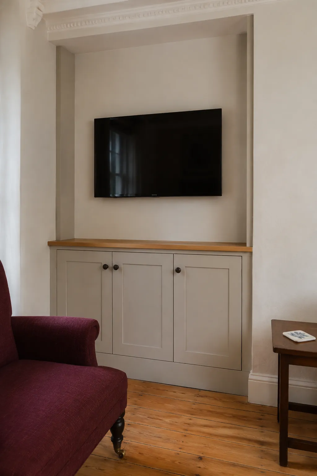 A fitted alcove installation in a practical built in television wall