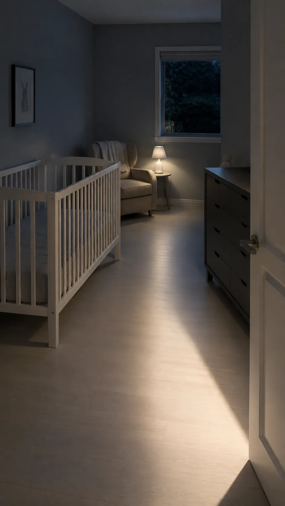 Show the practical difference between a bright hallway opening and a crib positioned outside its direct beam