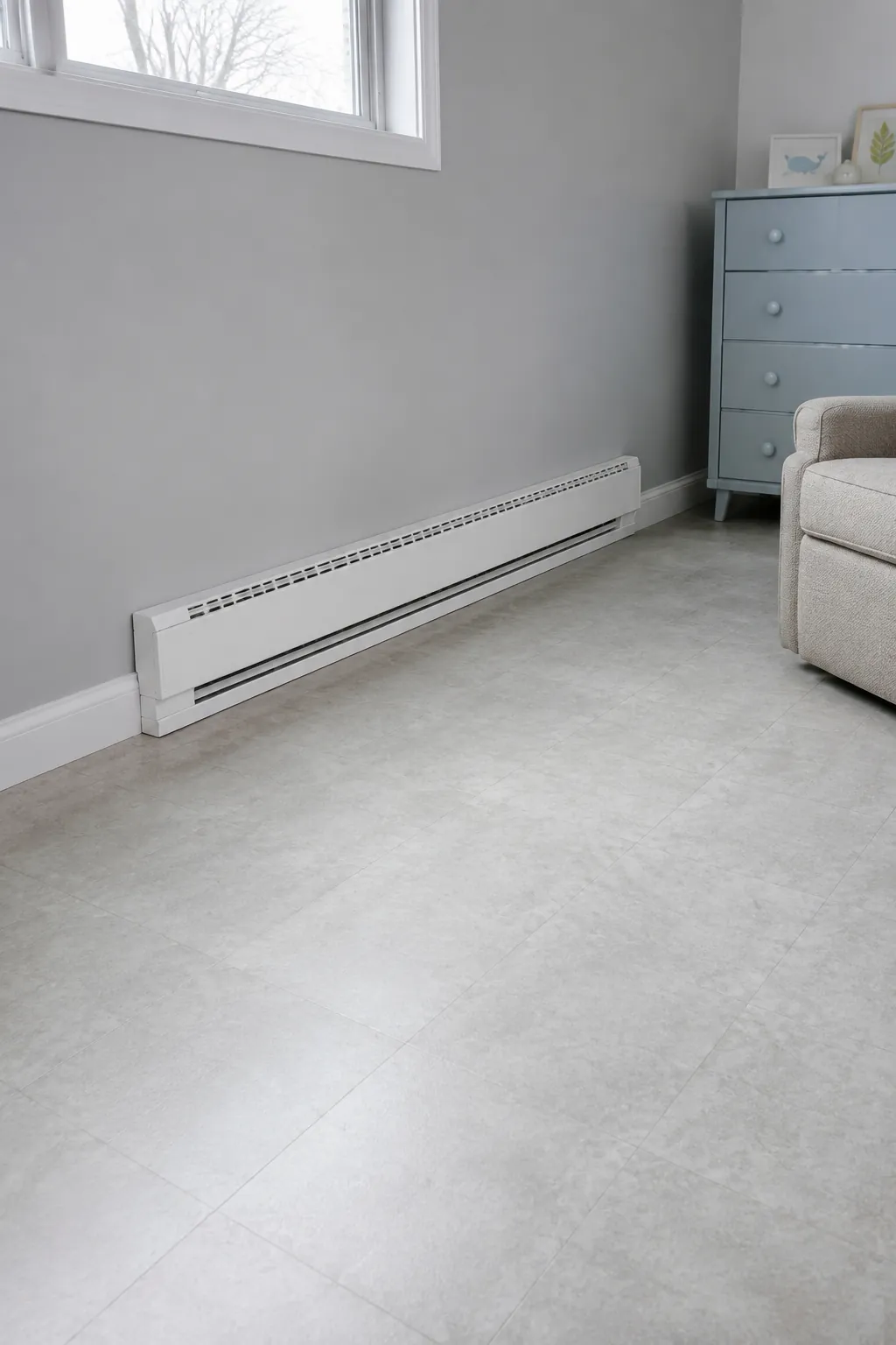 Photograph an unobstructed baseboard heater in a nursery, with the nearest furniture clearly placed elsewhere