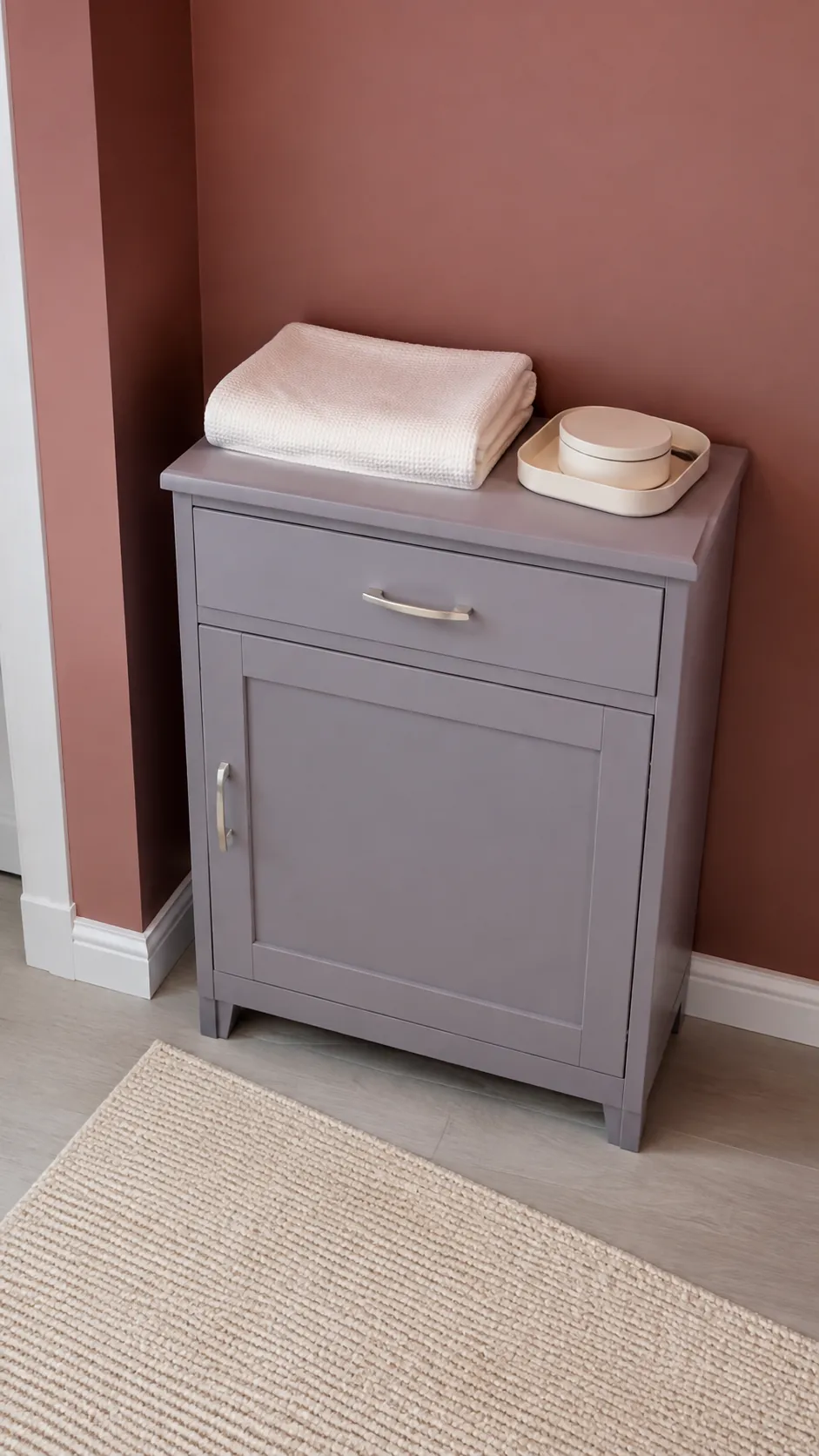 Lavender Gray and Rose Clay nursery with lavender gray cabinet against a rose clay wall