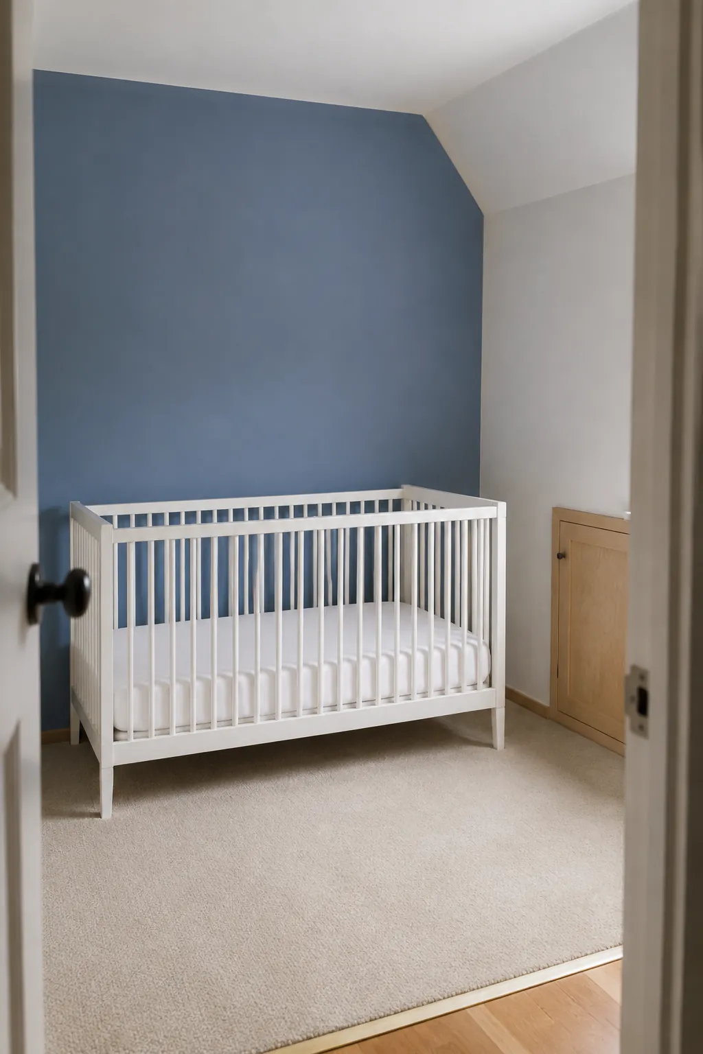 Warm White With a Blue Accent Wall nursery color scheme