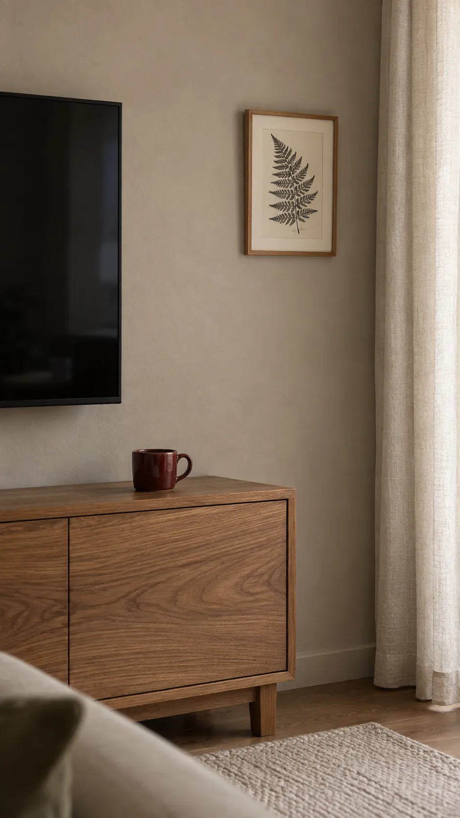 Use texture to keep the wall from feeling bare in a minimalist TV setup