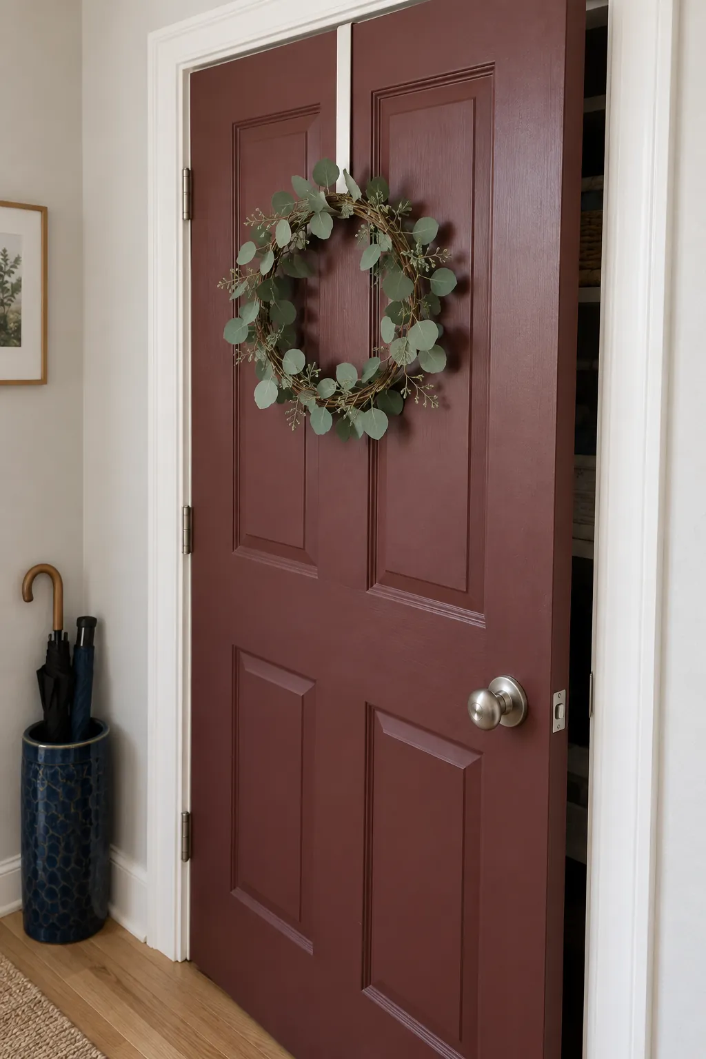 Small eucalyptus wreath on a slim interior closet door hanger
