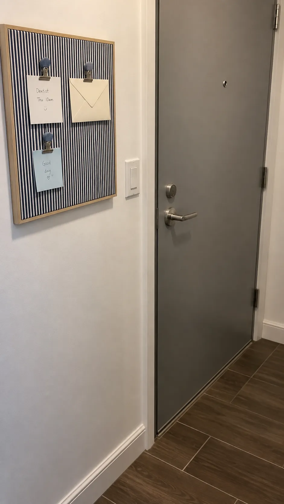A flat fabric memo board near the exit