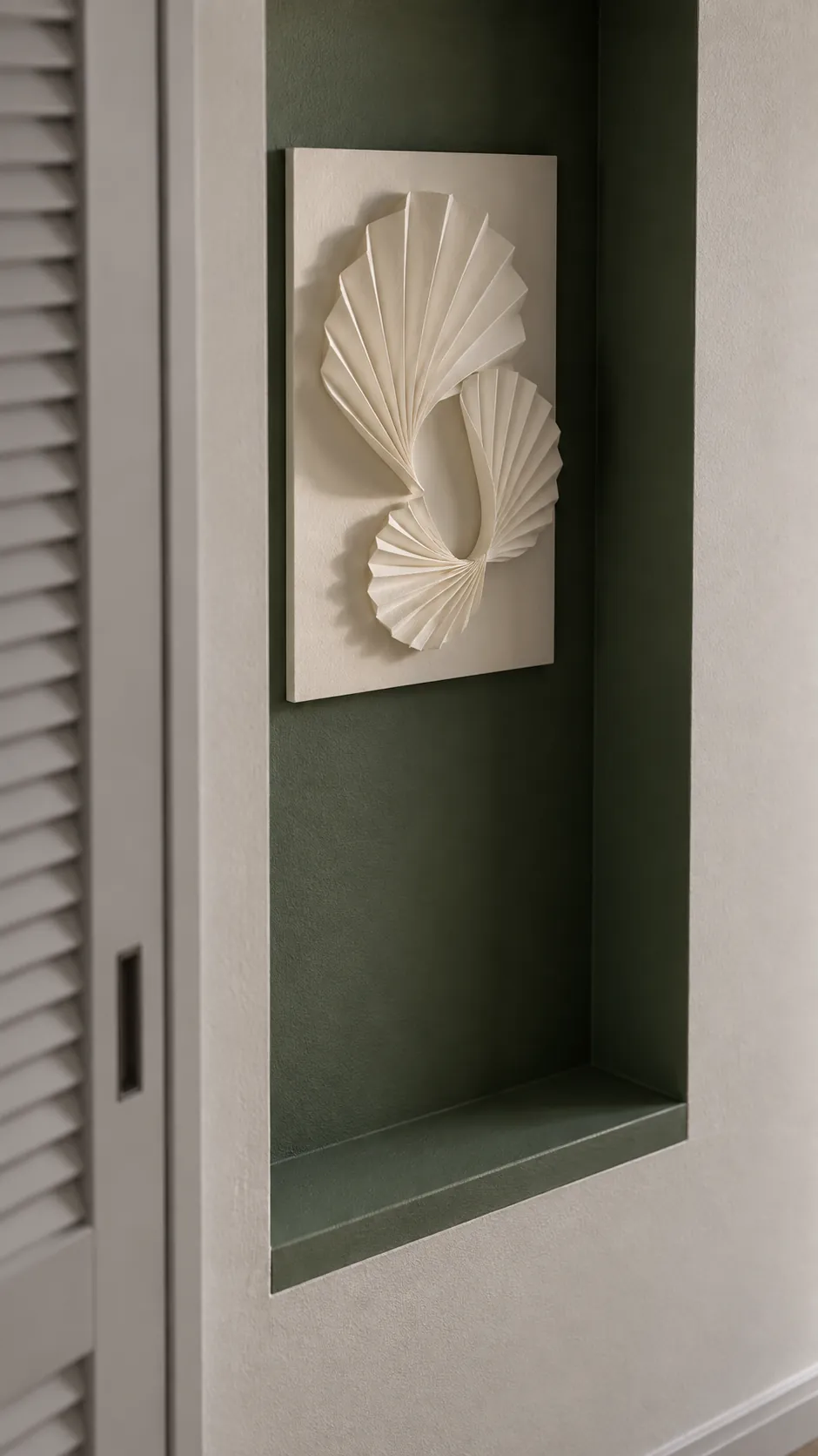 A small sculptural relief in an alcove