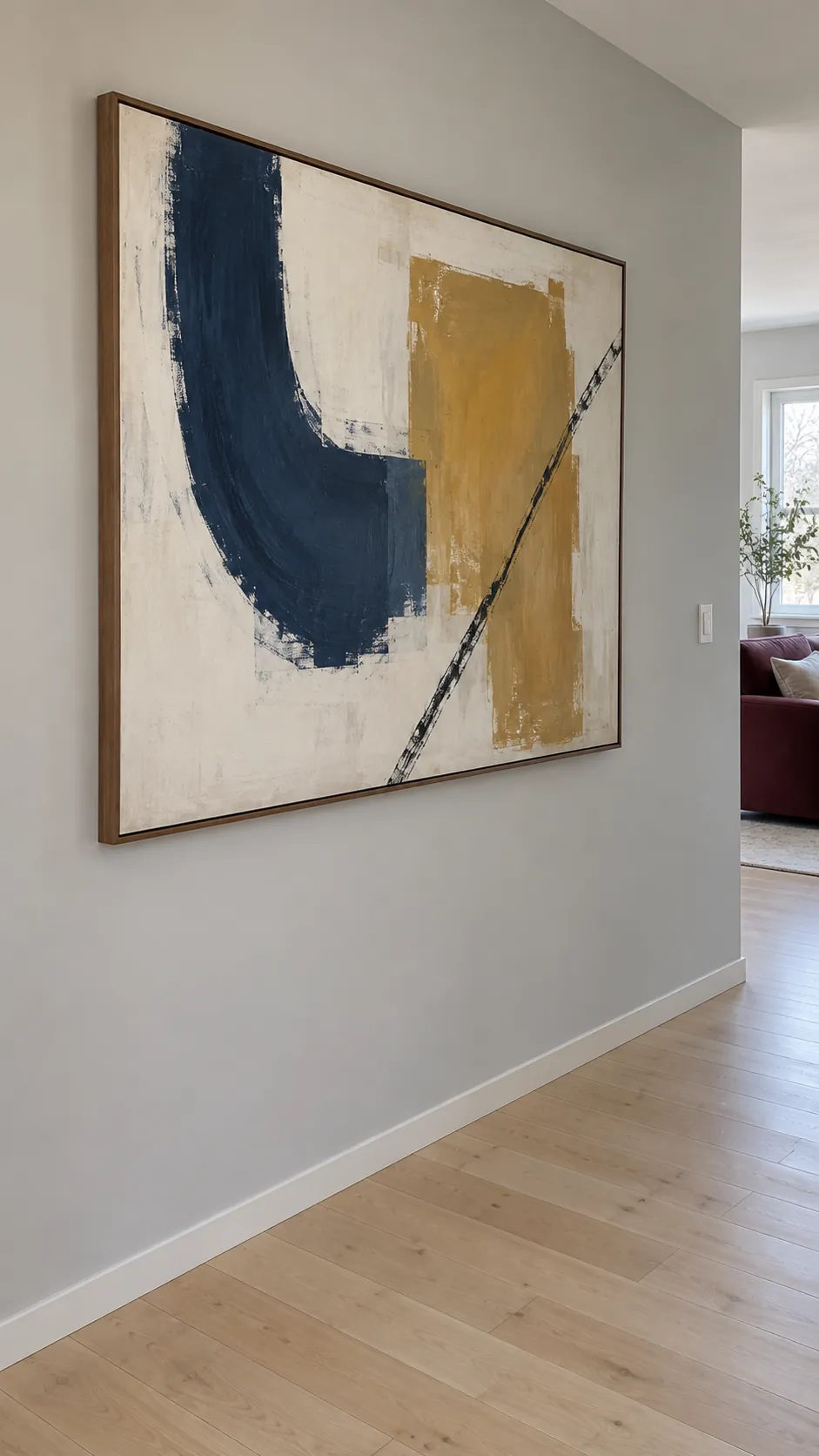One oversized abstract canvas against a quiet wall